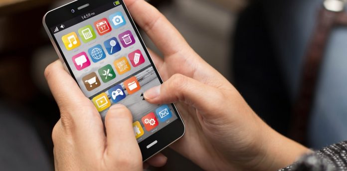 Overskrift for apper for person som holder smarttelefon