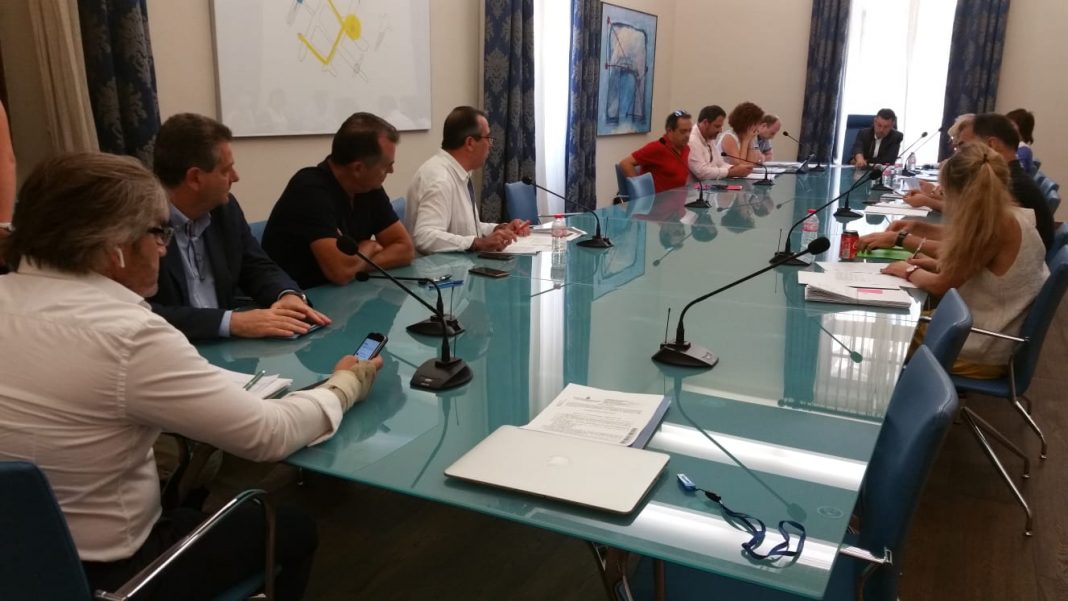Comisión-1