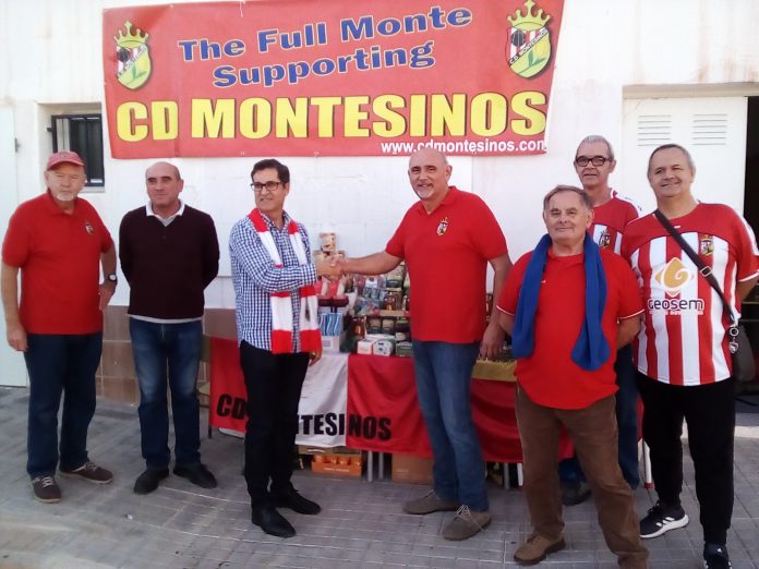 Los Montesinos Mayor José Butron with CD Montesinos supporters President Eddie Cagagio presenting the food donations for the municipal food bank.