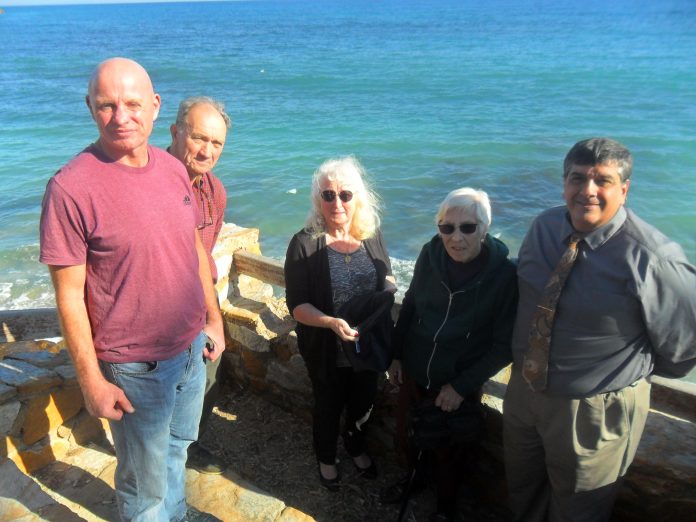 Pictured (l-r) Relatives, Eileen Mayes, Maureen Kilby and pastor Rafael Restrepo.