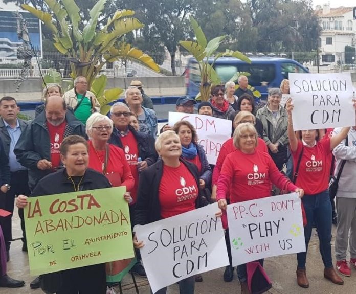 Employees and residents protesting in front of Playa Flamenca Town Hall against recent closure of Orihuela Costa Municipal Sports Centre