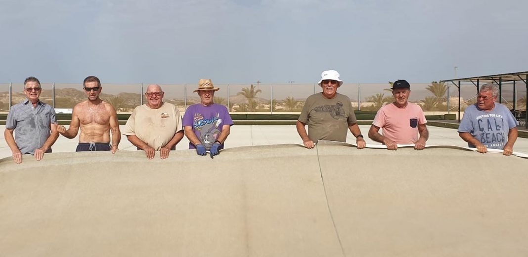 Some of our members getting stuck in preparing for the new carpet.