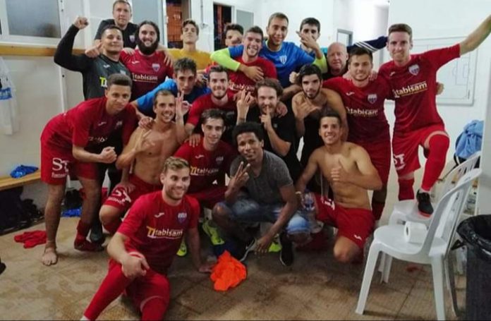 Racing San Miguel celebrate in the dressing room after a 5-2 win over Sporting San Fulgencio.