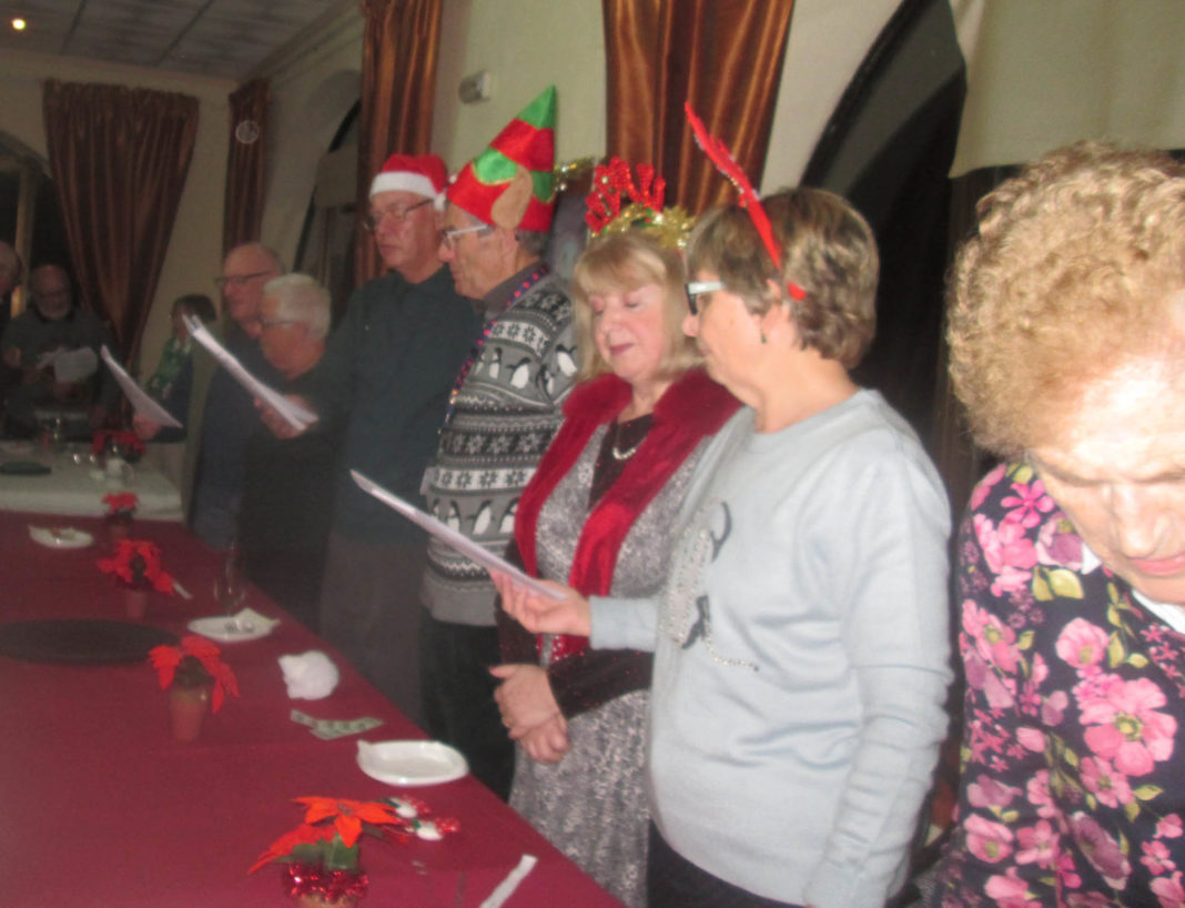 Carols close Torrevieja RBL Christmas Meeting