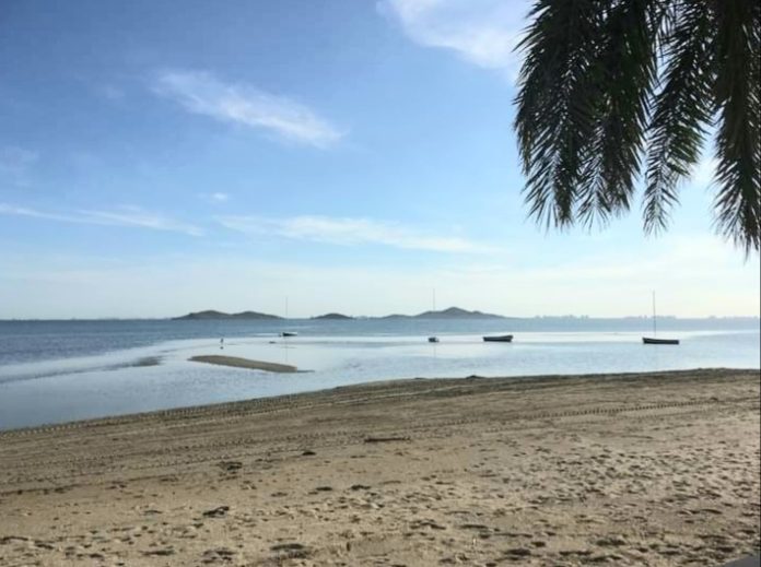 Mar Menor sea level notably lower, exposing sand banks along Playa Punta Brava