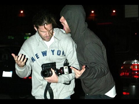 Chris Martin attacks Papparazzi