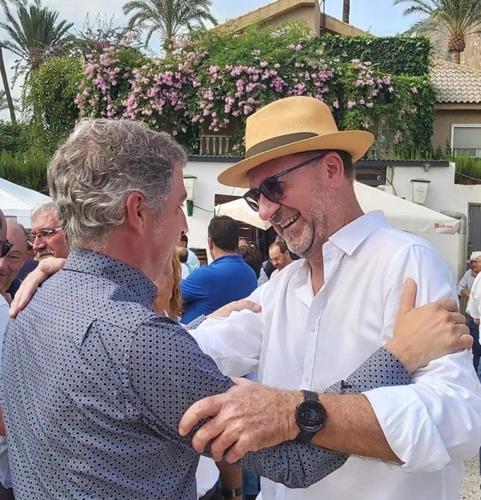 Emilio Bascuñana congratulating Vegara on his nomination