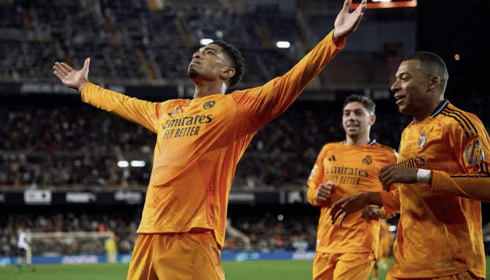 Real Madrid showcased grit and determination in the rearranged 12th-round League match at Mestalla, with Bellingham scoring to secure a 2-1 late victory to reclaim the top spot in La Liga.