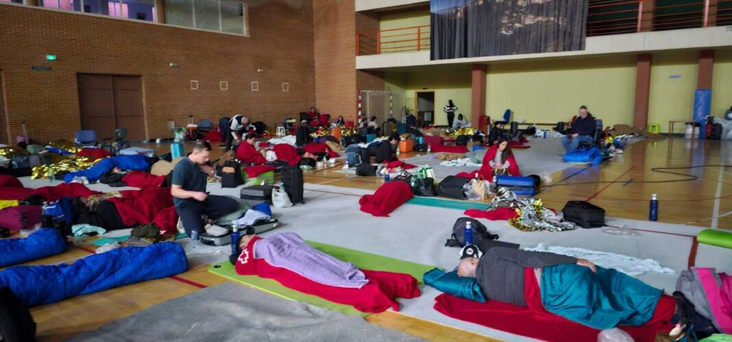Leader reporter Mark Nolan was one of 500 Renfe passengers bound for Madrid who were taken off the train before being shipped on 14 buses to a local sports centre to spend the night