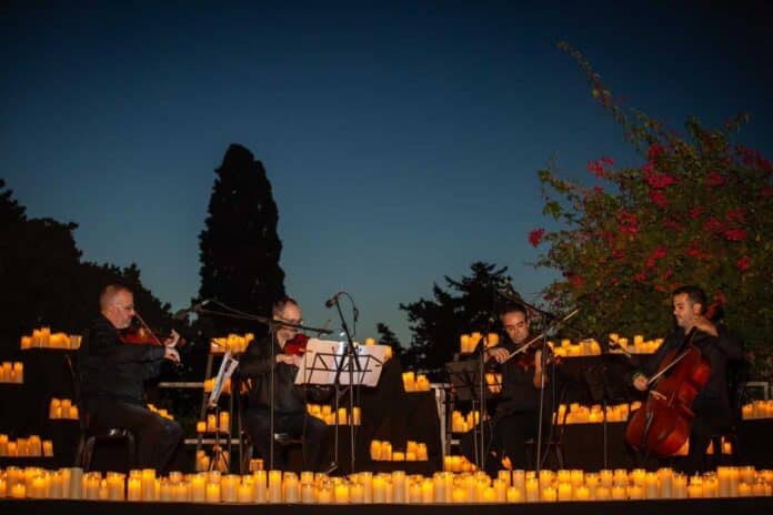 The magical evening was illuminated by approximately 5,000 candles and set in a natural location generously provided for the occasion by Solange Zilbermann.