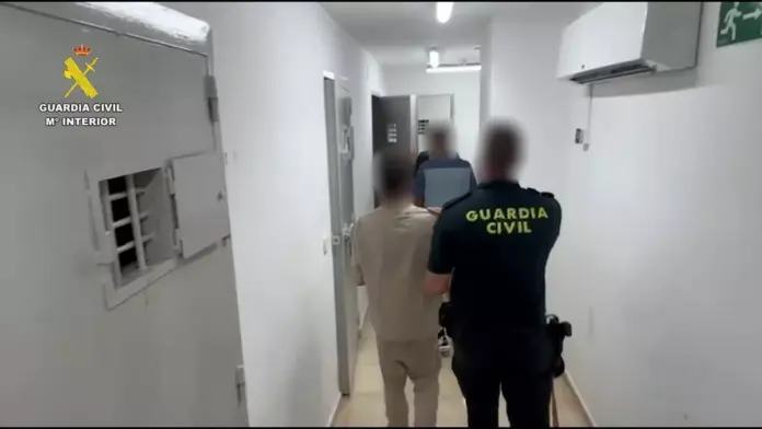 One of the thieves being escorted to his cell in Torrevieja The suspects, aged 31 and 32, were arrested by the Civil Guard after four alleged robberies carried out between March and May. Their victims were aged between 75 and 93.